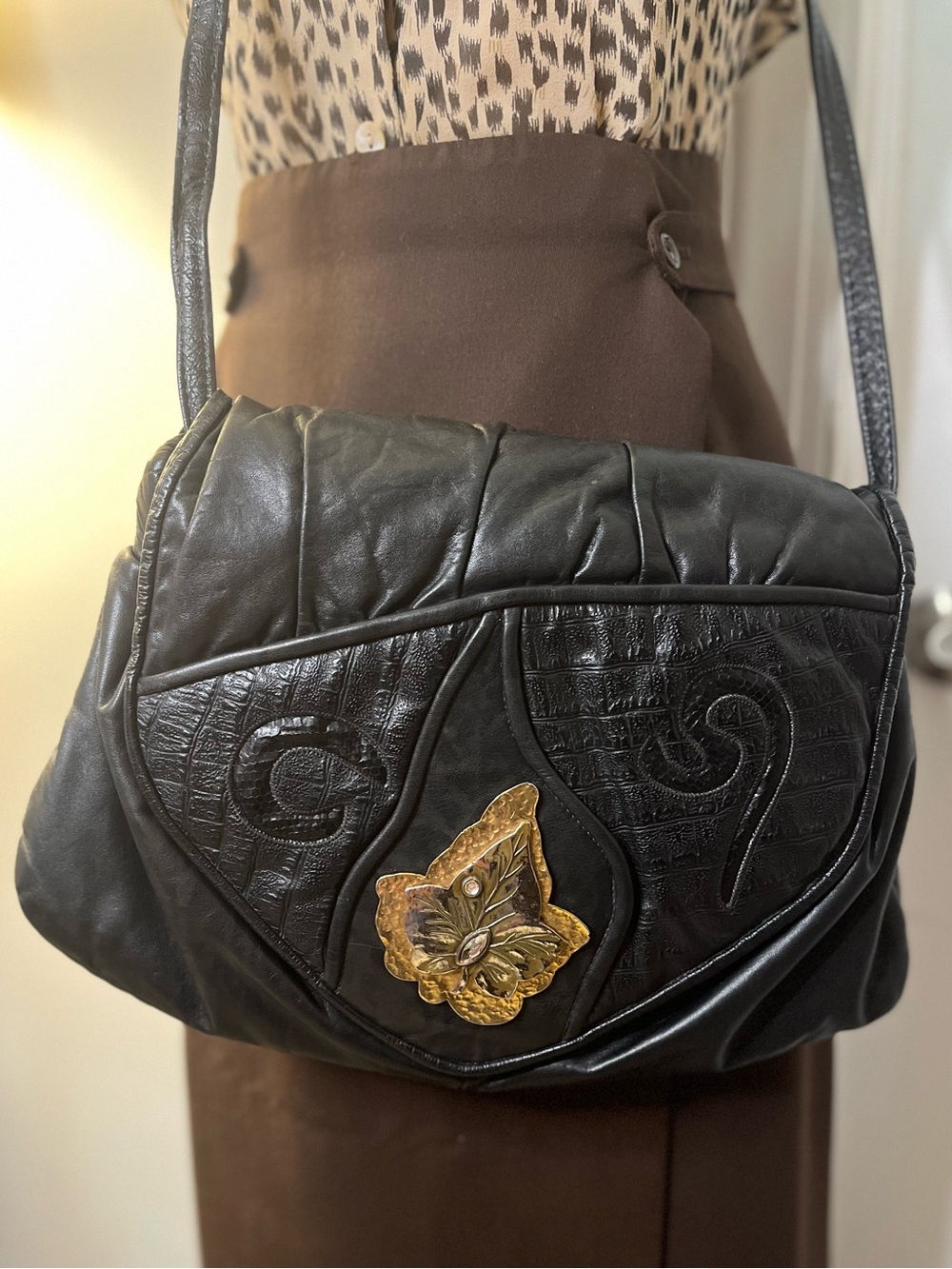 Vintage Black Leather Park Ave. Shoulder Bag with Decorative Emblem